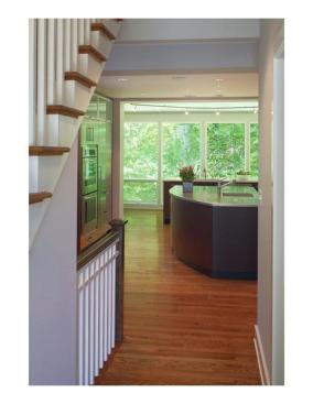 A+floor-to-ceiling+glass+wall+offers+big+views+of+Washington%2c+DC%27s+Rock+Creek+Park.