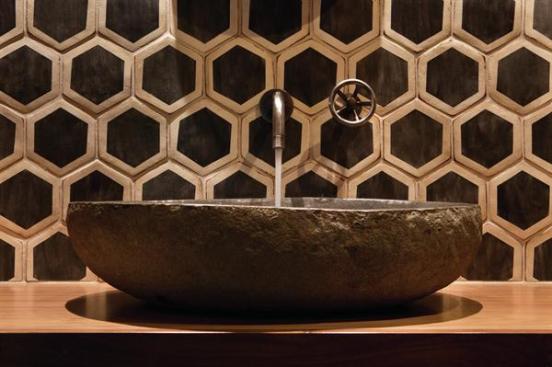 Bold+wall+tile%2c+a+stone+sink%2c+and+a+simple+wall-mounted+fixture+might+not+work+in+a+bigger+or+busier+bath%2c+but+here%2c+they+pack+a+visual+punch.