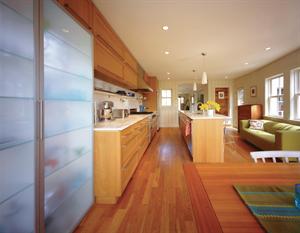 Efficient use of space and a little judicious squeezing yield a do-everything room for an active family.