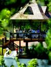 SWAN LAKE: "Soft programming" allows prospective buyers to sample the lifestyle of a community for an afternoon. This party on a bandstand and boat dock near Atlanta is one such example.