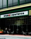 HANGOUT: An inviting outdoor seating area gives shoppers a place to relax outside The Estridge Home Experience in an upscale mall in Carmel, Ind.