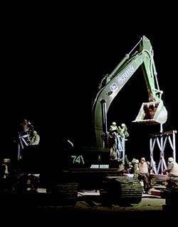 “WE BUILD, WE FIGHT”: Since the attack on Pearl Harbor in 1941, this has been the motto of the Navy Seabees, who are trained in both construction and combat. Over the decades, battalions such as this one in Iraq have built landing strips, bridges, hospitals, schools, and much more in active war zones.