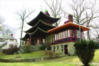 This is D.C.?: A Japanese pagoda (shown here) and English manor-style hotel (below) are among the 23 vintage structures that will eventually be transformed into residences at the National Park Seminary in Forest Glen, Md.