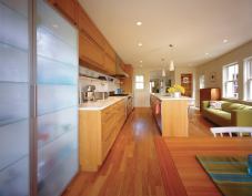 Efficient use of space and a little judicious squeezing yield a do-everything room for an active family.