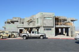 Under construction in the Nevada desert, the New American Home will show off a range of sustainable building products, including a weather-sensitive irrigation system, tankless water heaters, hydronic air handlers, and intelligent fireplaces.