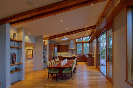 Measuring 42 feet wide by 17 feet deep, the home features a large combination kitchen, dining room, and living room.