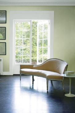 Benjamin Moore's 2015 Color of the Year Guilford Green can be used as both an accent and the main event. Here, it creates a relaxing atmosphere that becomes synonomous with the nature outside the french doors.