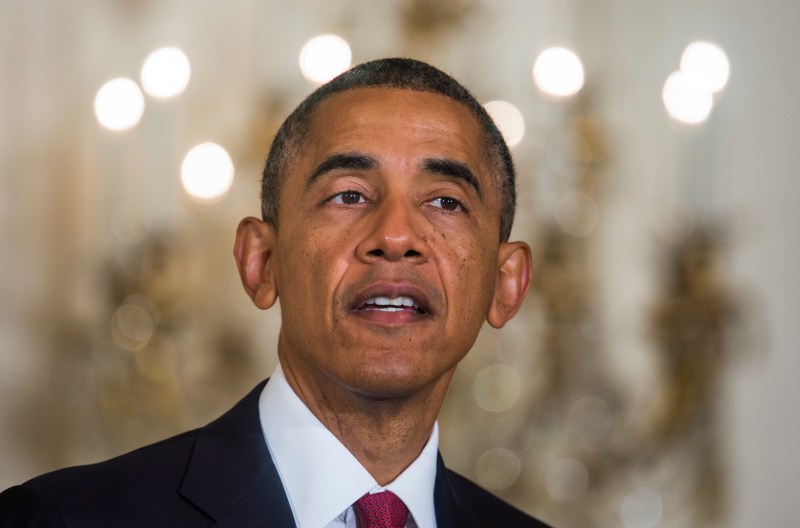 WASHINGTON, DC - JULY 04: (AFP OUT) U.S. President Barack Obama speaks after presiding over a naturalization ceremony for active duty service members and civilians in the East Room of the White House on July 4, 2014 in Washington, DC. On Monday Obama pledged to use executive orders to circumvent congress and move ahead with immigration reform.  (Photo by Jim Lo Scalzo-Pool/Getty Images)