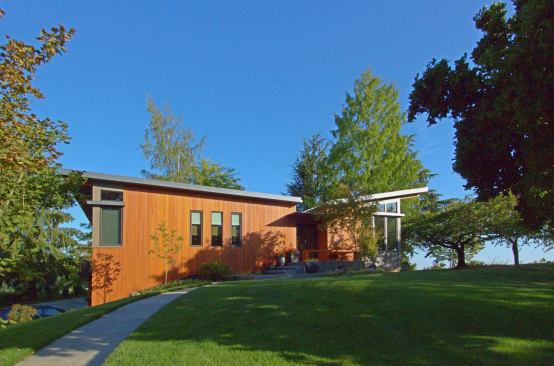 The home’s butterfly roof allows light to penetrate the interior.