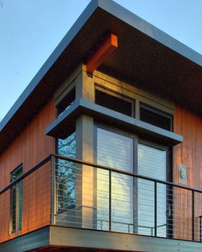 The home’s master bedroom features a spacious deck.