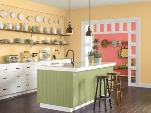 Sherwin Williams showcases its 2015 Color of the Year Coral Reef in the background with coordinating colors Hubbard Squash and Ryegrass.