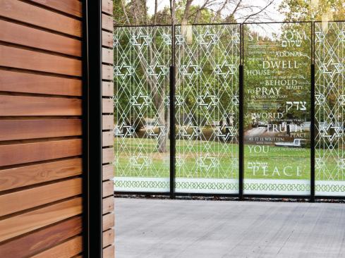 “The clear glass panel in the other courtyard has phrases about people getting together and recognizable words to engage the public.”