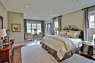 Main-level master suites are popular, like this one from plan HWBDO11991. See more images, information, and the floor plan. Photo by Carolyne Raney, Simply Irresistible Photography.