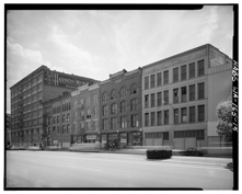 The historic, four-story McDonald Smith building was built in 1892 for E.A. McDonald and F.C. Smith who were in the wholesale hay, grain and feed business that flourished along Pacific Avenue at the end of the 19th and in the early 20th centuries.