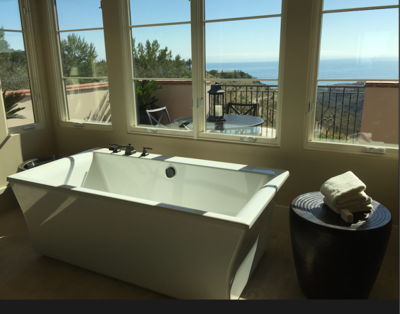 "Her" master-bath in one of The New Home Company's Coral Crest plans, overlooking Abalone Point on the Newport Coast of California.