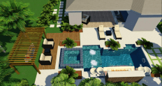 Florida foliage surrounds the pool in this backyard landscape