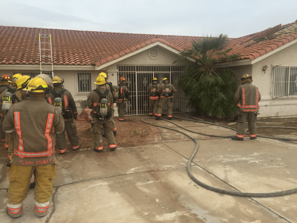The Clark County Fire Department's live fire training exercise in progress at one of the abandoned homes provided by American West Development.