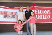 Sgt. John  Jaramillo, his wife Dania, and two young children Jazmin and John, Jr. received a new home from the Built to Honor program.