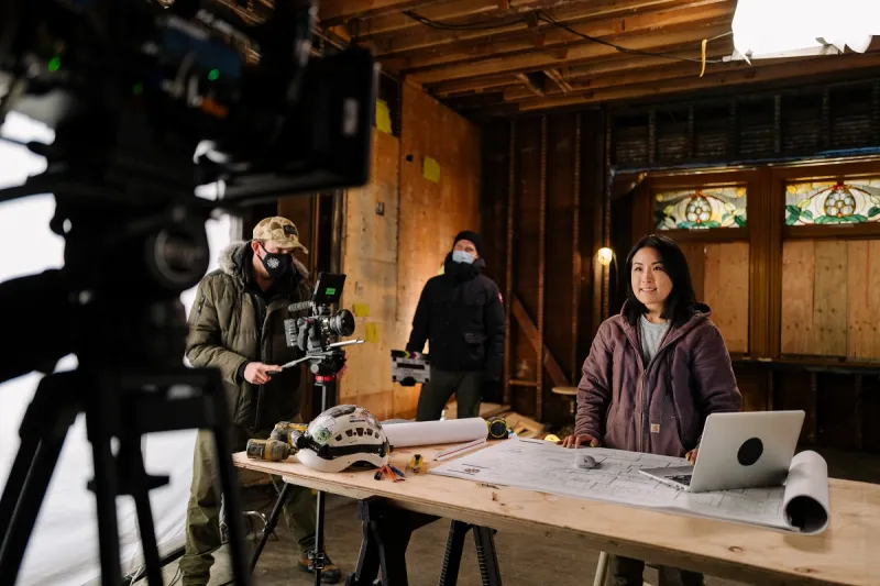 A behind-the-scenes look at carpenter and M.T. Copeland instructor Elly Hart explaining how to efficiently navigate commercial blueprints for an online course.
