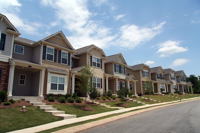 A row of new townhouses or condominiums.