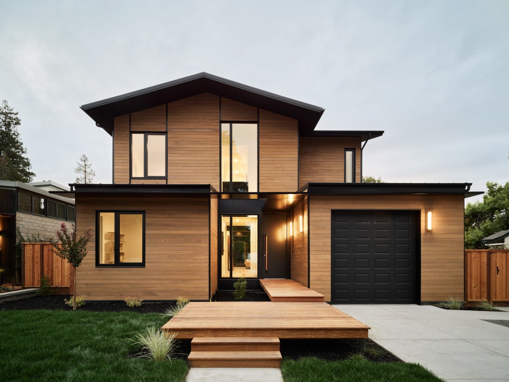 A steel entry canopy provides an understated yet design-forward signature.
