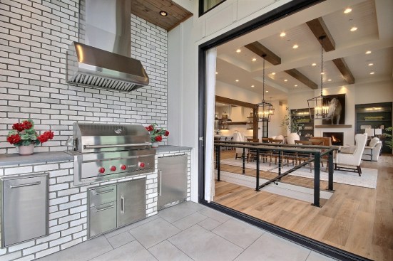 The outdoor kitchen of the Aurora Home that includes Eldorado Stone’s TundraBrick in Chalk Dust.  Photo credit: Cascade West Development