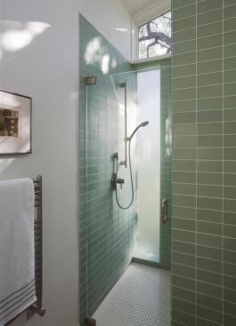 Even the shower is connected to the outdoors. Bath fixtures include a 1.75-gpm shower unit, and Watersense-certified lav faucet and toilet. Locally sourced limestone lines the floor. 