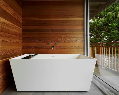 A bathroom measuring less than 100 square feet is transformed into a spa-like retreat that takes full advantage of the site’s Marin Headlands views. Architect: Jason Langkammerer, At-Six Architecture; Builder: Rafael Rodriquez, Raff’s Construction