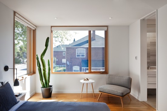 The architects carefully edited the views seen through the windows, from Ross Windows & Doors, to capture the best of city life.