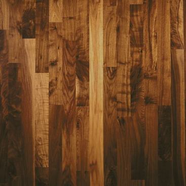 Dark and consistent, this select walnut flooring offers a distinctive, upscale look. To minimize the sapwood variations, the company steams its walnut to create a more uniform and rich floor. The solid wood boards measure about 36 inches long. www.wdflooring.com.
