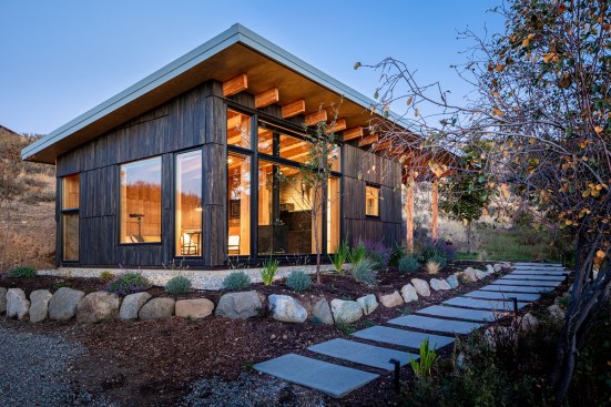 A stone pathway leads to Casita’s entrance, covered patio, and detached sauna.