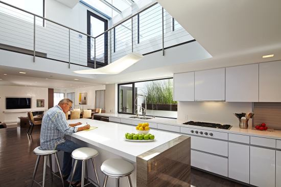 It's not news to anyone that the kitchen remains a hub. In response, though, kitchen islands have to work harder than ever before: dining table, homework station, prep space, storage unit, and a place to hang out. It's the advent of the super-island.