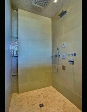 2013 Grand winner, Master Bath in a custom home: Pima Canyon Master Bath Niche shelves in the shower provide space for bath items in this sleek shower.