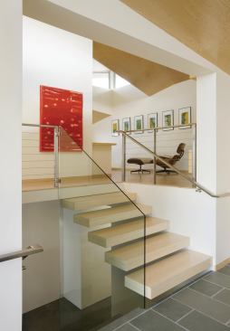 The entry way opens up to both living and sleeping sections of the flexible floor plan as well as offering immediate access to the beaches beyond.