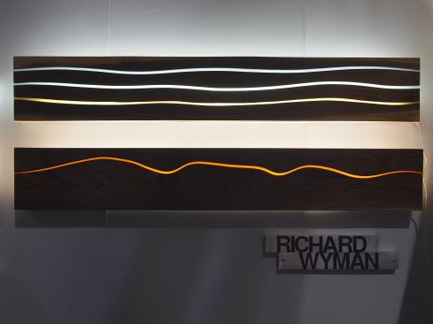 Richard Wyman Design&nbsp;Richard Wyman specializes in sculptural lights crafted from hard woods, acrylics, and colored resins. His current emphasis is on custom work for architects and interior design.
