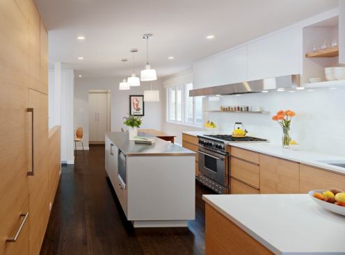 After: Light modern finishes, new appliances, and abundant natural light have made this kitchen bright and welcoming.