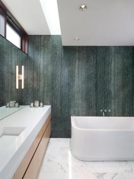 A wall of Kenyan black marble creates a supremely serene master bath.   
Project: Lakeview Residence, Austin, Texas; 
Designer: alterstudio
