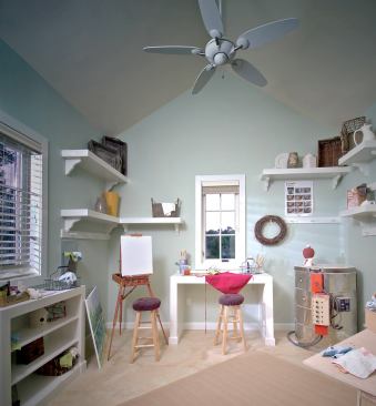 A SEPARATE PEACE: An intimate outbuilding in the rear yard has all sorts of possibilities—workshop, art studio, potting shed, kids' clubhouse, storage unit, you name it. Air is kept circulating in the vaulted room with a ductless A/C unit. Its clean façade of Sherwin-Williams SuperPaint Exterior Acrylic Latex Satin ties in with the main residence.