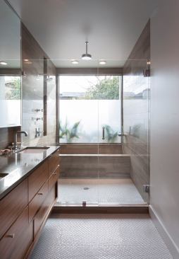 The Elizabeth Street Master Bath, another 2013 Watermark Awards winner, features a neat twist on the oversized shower/wet room idea: Here, the bathtub is actually inside the shower.