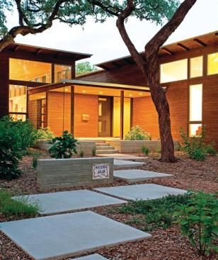 A walk through the trees brings you to this inviting entrance-a feature the judges were drawn to during their review.