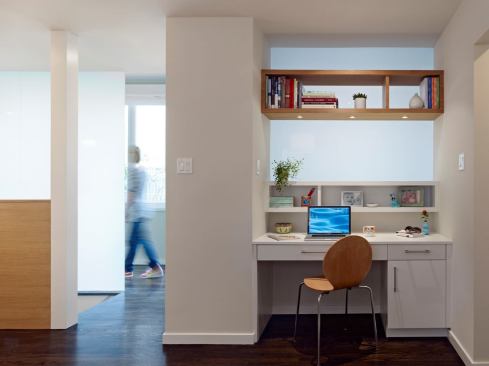 A new built-in office area with a translucent wall behind the desk allows for even more light to enter the space.