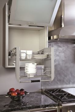 The Surprise Rev-A-Shelf’s pull-down shelving system is a chrome-plated two-tier shelf that brings hard-to-reach items closer within reach. The gas-assisted lifting/lowering mechanism provides sleek stability, and the arms lock in the down position. It’s available for 24-inch and 26-inch wall cabinets. 
Rev-A-Shelf.