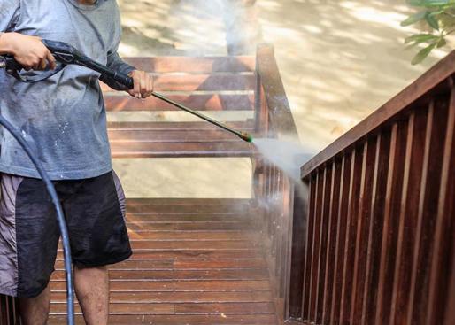 Deck railing power washing to preserve the life of the wood