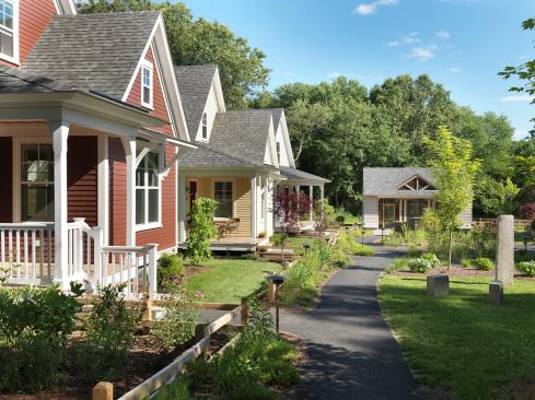 In Riverwalk, a cottage community in Concord, Mass., homes surround a common green, enhancing a sense of community and expanding living space outdoors.