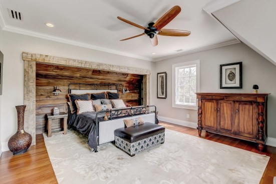 The boards lining the interior niche are from a barn in Monkton, Maryland, while the perimeter beams came from Greenwich, Connecticut.