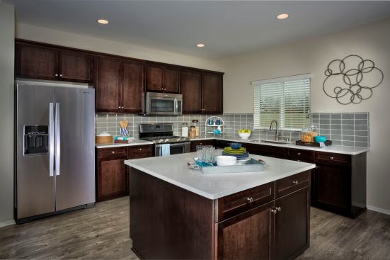 The kitchen features energy- and water-conserving appliances.
