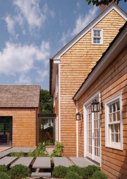 The old house contains a master suite (right foreground), entry hall, and three bedrooms on the second and third floors.