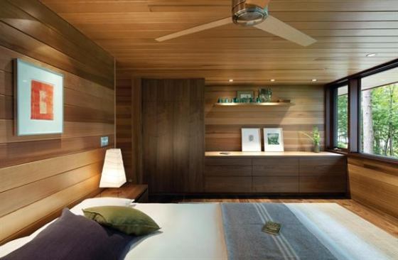 Wood paneling has gotten a bad rap, but the chic cedar siding found throughout this family retreat offers a clean look without losing the rustic flavor of the home’s wooded site.Project: Lakeside Camp, New Hampshire; Architect: Tom Murdough