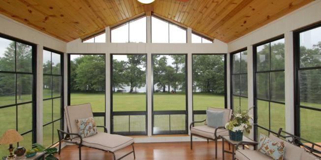 At only about $10.25 per square foot, Eze-Breeze is an affordable option for enclosing porches and patios. The aluminum framed, vinyl-glazed panels are strong, shatter-proof, and flexible while sporting the look of traditional windows. 
www.PGTEzeBreeze.com.
