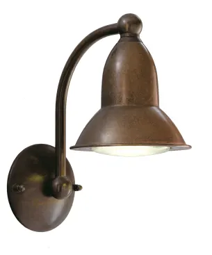 The exterior brass sconce from the Sunset line is 12 1/2-inches tall with a 5 1/2-inch canopy diameter. It is made from aged brass and is also available in a brushed silver finish.